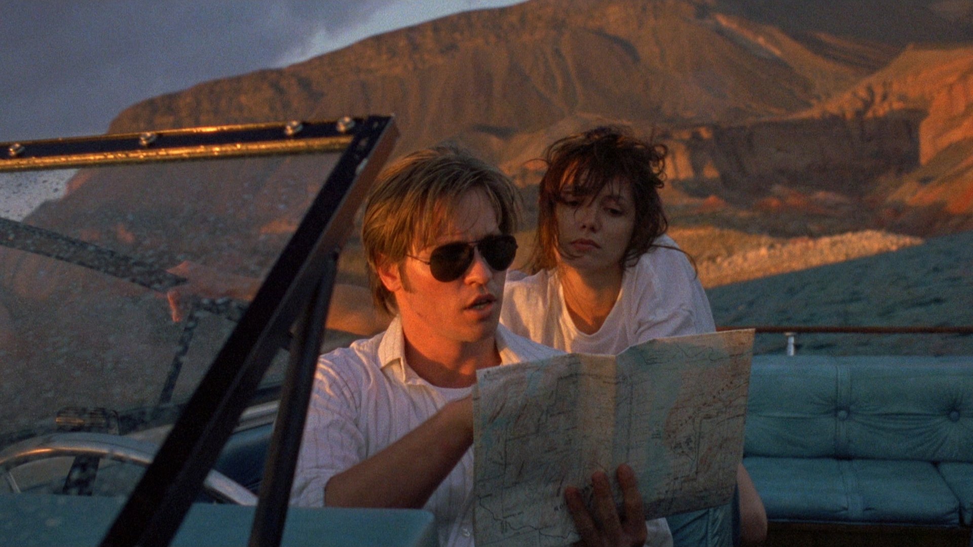 Kill Me Again Background