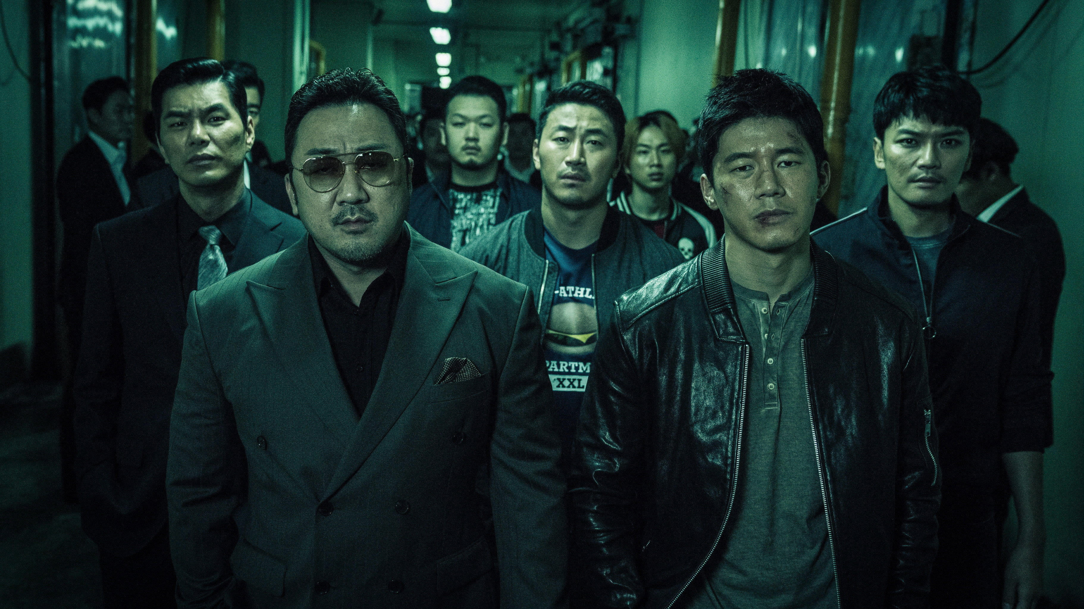 The Gangster, the Cop, the Devil Background