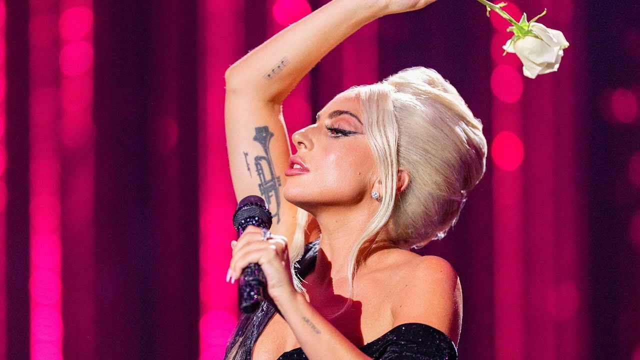 Lady Gaga Celebrates Love for Sale Background