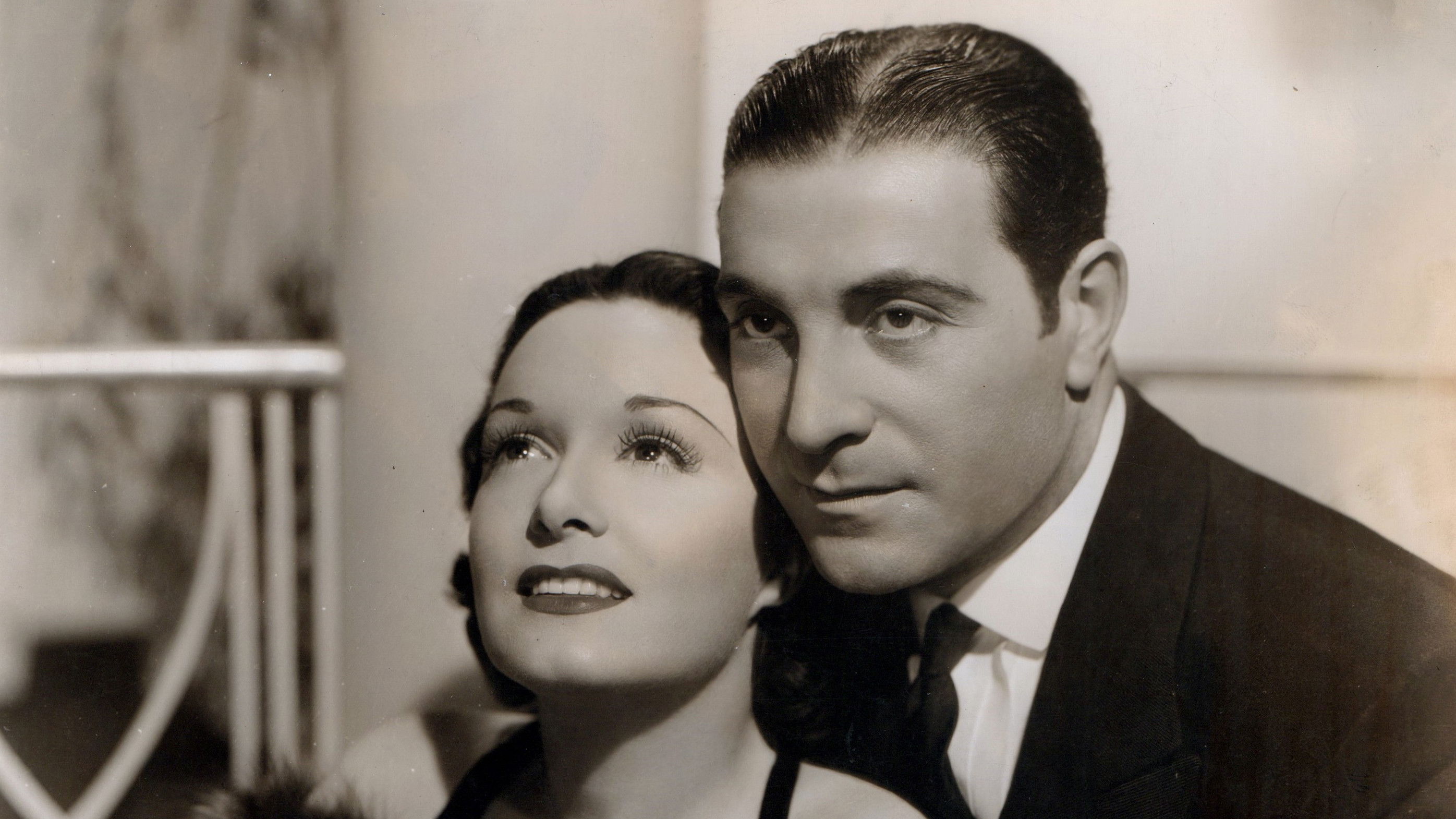 Her Husband Lies Background